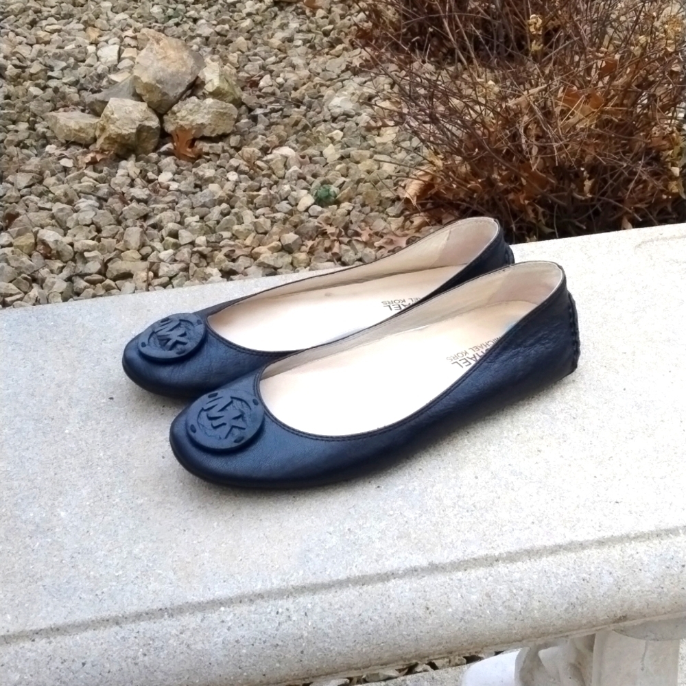 Michael Kors black leather flats with MK logo. Size 7.5